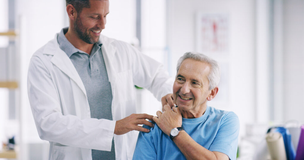 Shoulder Injury Evaluation and Recovery Patient receiving evaluation for shoulder pain after a dislocation.