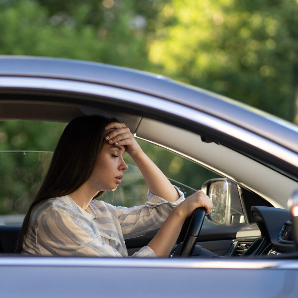 Driving Anxiety After a Car Accident Driver experiencing driving anxiety after a car accident while sitting behind the wheel