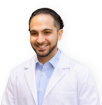 Professional provider headshot of Dr. David Mandil, MD, wearing a white coat over a light blue shirt against a white background.