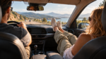 Female passenger with feet on the dashboard during a road trip, illustrating the position associated with feet on dashboard injuries